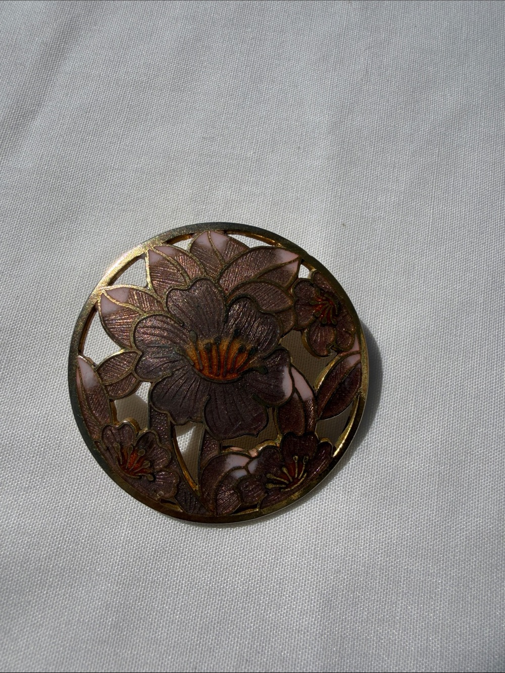 Sarah Coventry Mauve and Gold Floral Cutout Round pendant